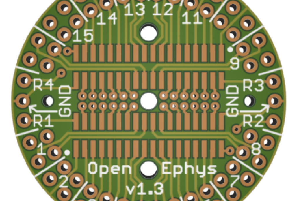 A round circuit board labeled Open Ephys