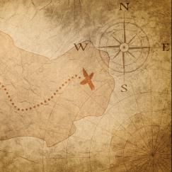 A tan colored treasure map features an island with a dotted line leading to a red X