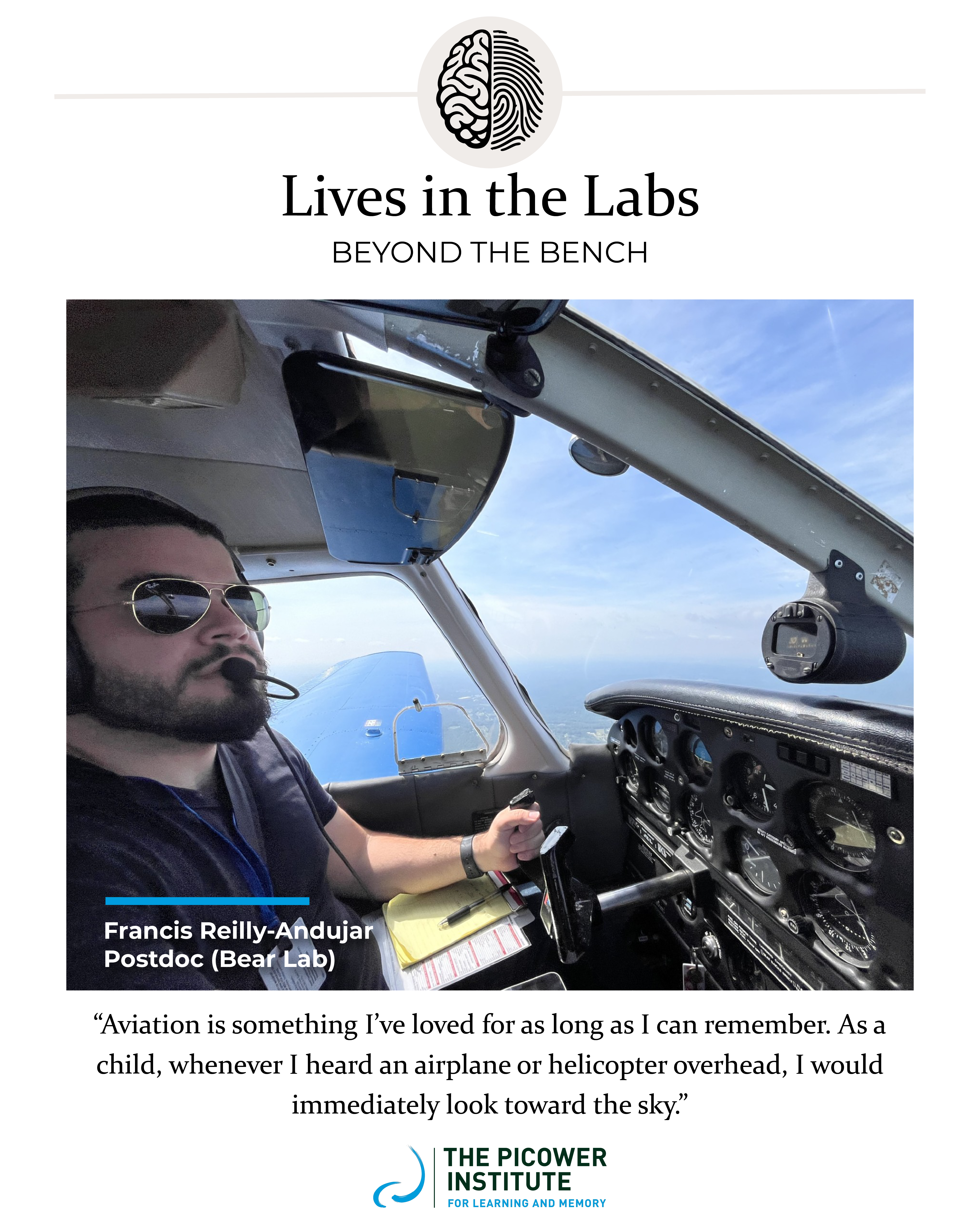 Francis Reilly-Andujar looks out through the windows of the cockpit of a plain while he holds the yoke.