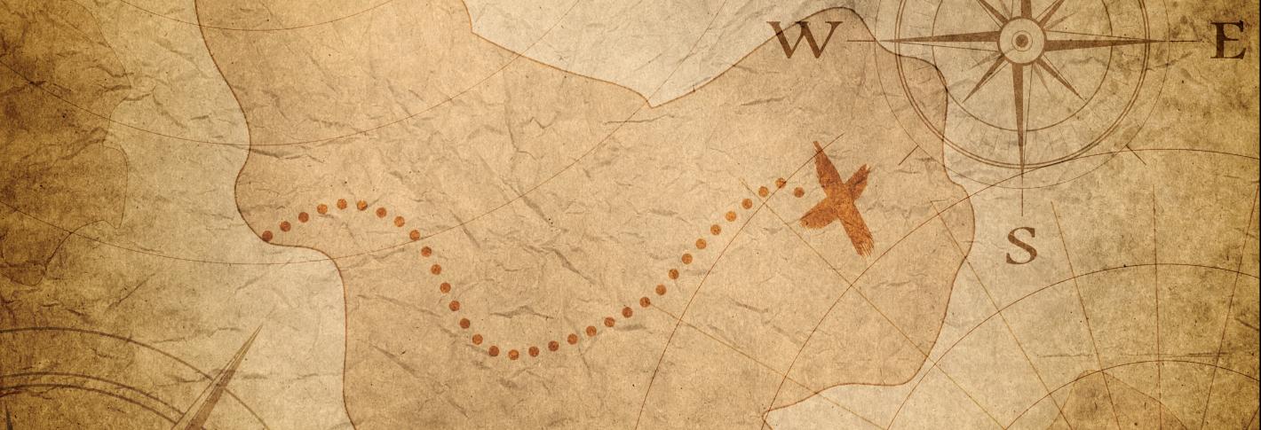 A tan colored treasure map features an island with a dotted line leading to a red X