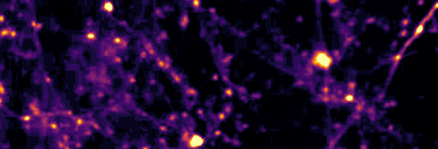 Over a tangle of dark blue neurons, bright orange spots appear along the lengths of some of the axons, highlighting their paths through the tangle