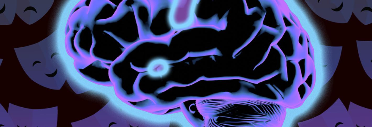 A black brain shown in a side view glows blue. The amygdala, a small almond-shaped structure toward the bottome center stands out especially. In the background there are theater masks signifying emotions.