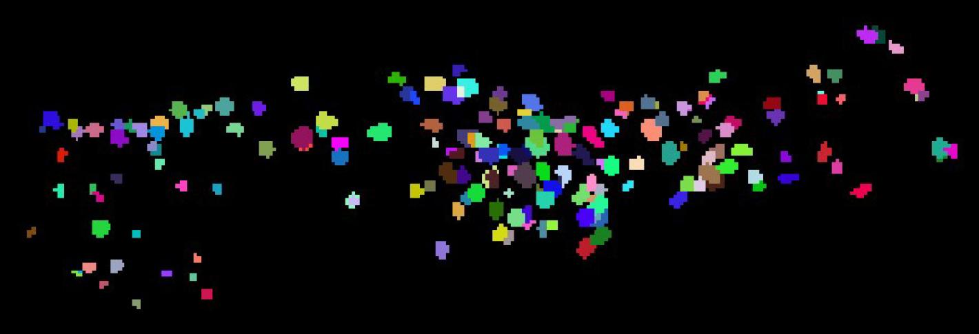 a series of small blocky spots of color appear in the aggregate to make up the shape of a worm as it stretches horizonally across a black background